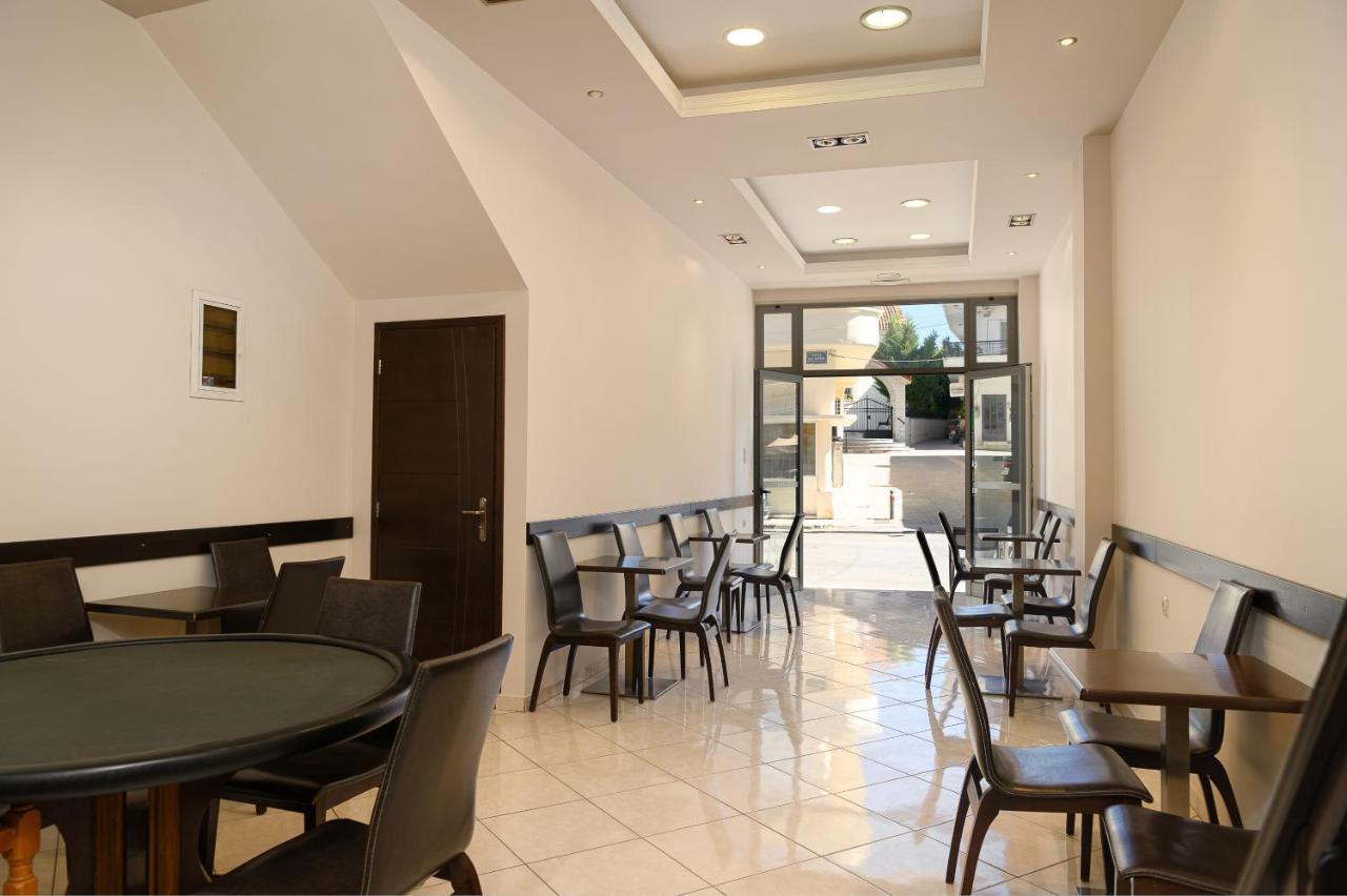 Olympic Hotel Moírai Buitenkant foto